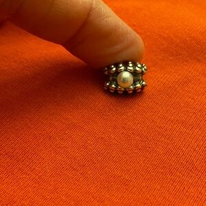 Pandora sterling silver shell with pearl retired charm.